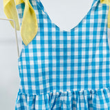 Kariertes Kleid mit gelben Schleifen für Mädchen