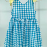 Kariertes Kleid mit gelben Schleifen für Mädchen